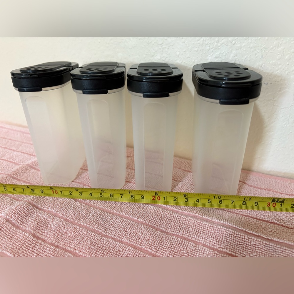 TUPPERWARE LARGE SPICE
SHAKERS FLIP TOP BLACK SEALS
POUR SPOUT/SPRINKLE 4pc SET - Picture 3 of 16